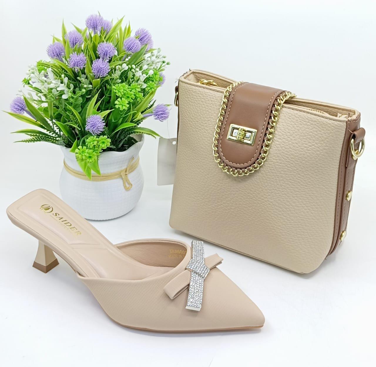 Complete your look with this elegant handbag & matching heels set – perfect for any occasion! 💃