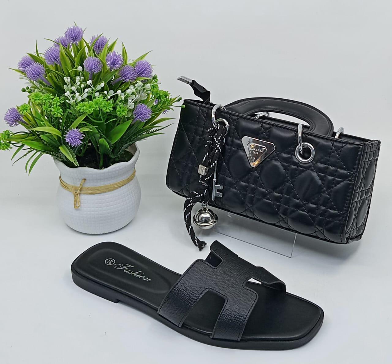 Stylish Matching Set – Includes a trendy shoulder bag and elegant slip-on sandals in coordinating silver tones.