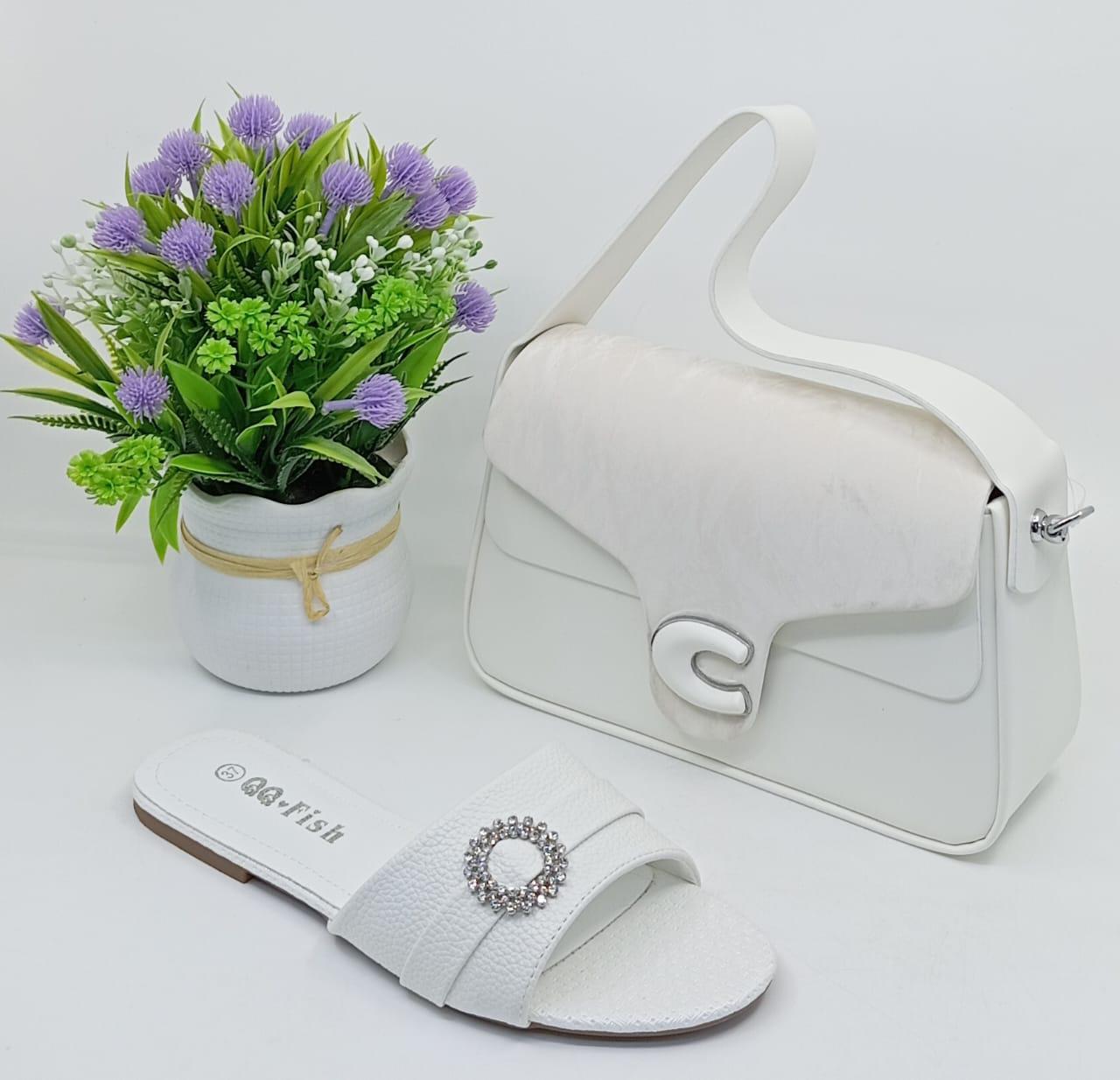 The handbag and sandals together create a coordinated, elegant look—ideal for parties, casual outings, or gift sets.