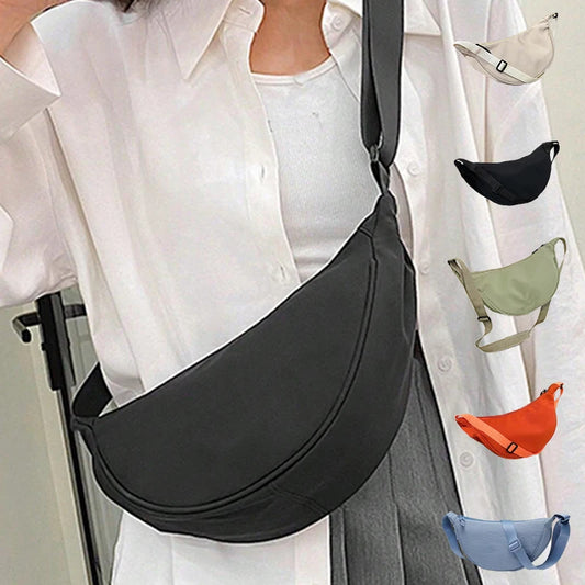 Women's single-shoulder bag - shaped like a dumpling, with a single zipper, can be worn diagonally across the shoulder.