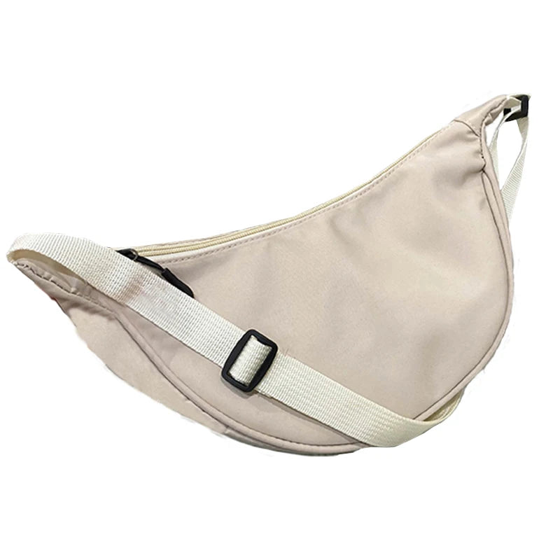 Women's single-shoulder bag - shaped like a dumpling, with a single zipper, can be worn diagonally across the shoulder.