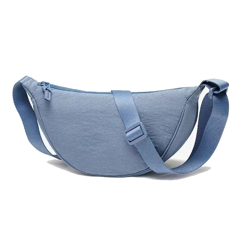 Women's single-shoulder bag - shaped like a dumpling, with a single zipper, can be worn diagonally across the shoulder.