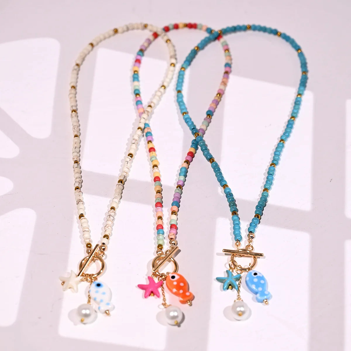 ZAKOL Bohemian Sea-Inspired Ceramic Fish & Starfish Pendant Necklace Dopamine Rainbow Color Beads Necklaces Beach Jewelry