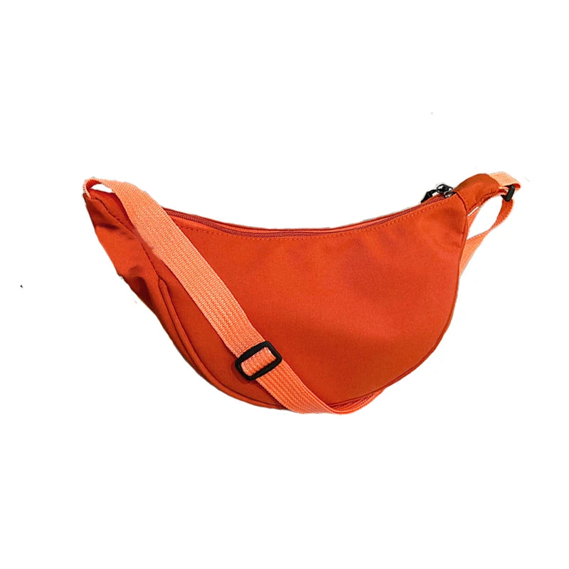 Women's single-shoulder bag - shaped like a dumpling, with a single zipper, can be worn diagonally across the shoulder.