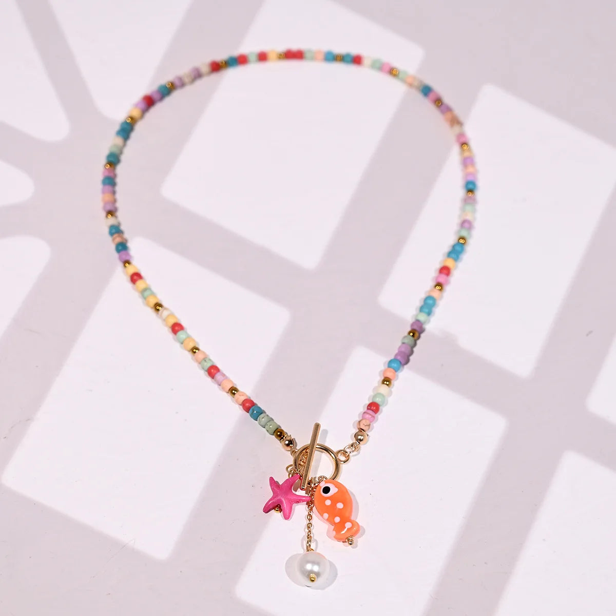 ZAKOL Bohemian Sea-Inspired Ceramic Fish & Starfish Pendant Necklace Dopamine Rainbow Color Beads Necklaces Beach Jewelry
