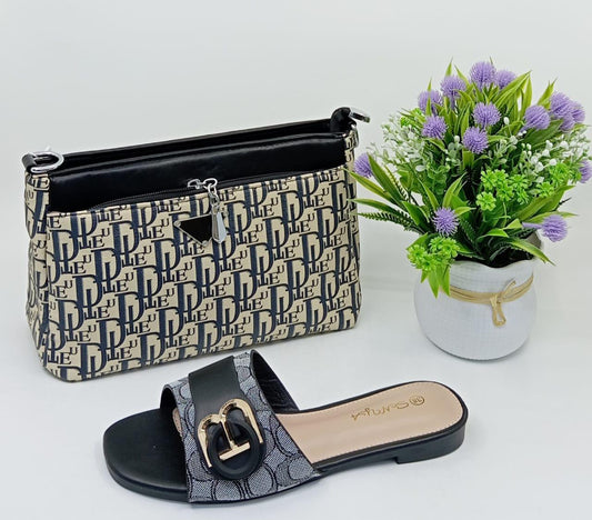 A stylish women’s handbag with  A  slide sandal with a sparkly embellishment