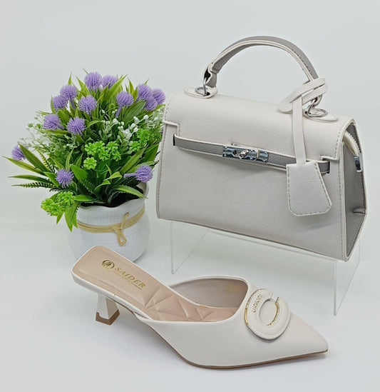 Complete your look with this elegant handbag & matching heels set – perfect for any occasion! 💃